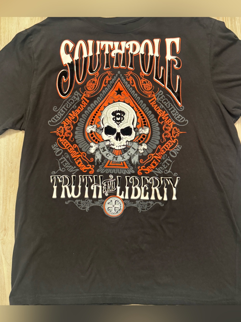 Y2K South Pole Black Short Sleeve Tee with Orange & Gray Skull Graphic